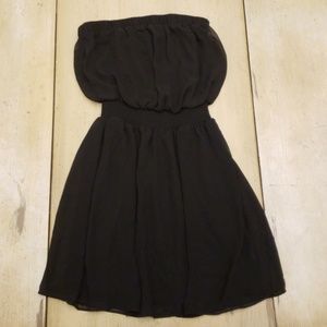 Black, flowing, strapless dress
